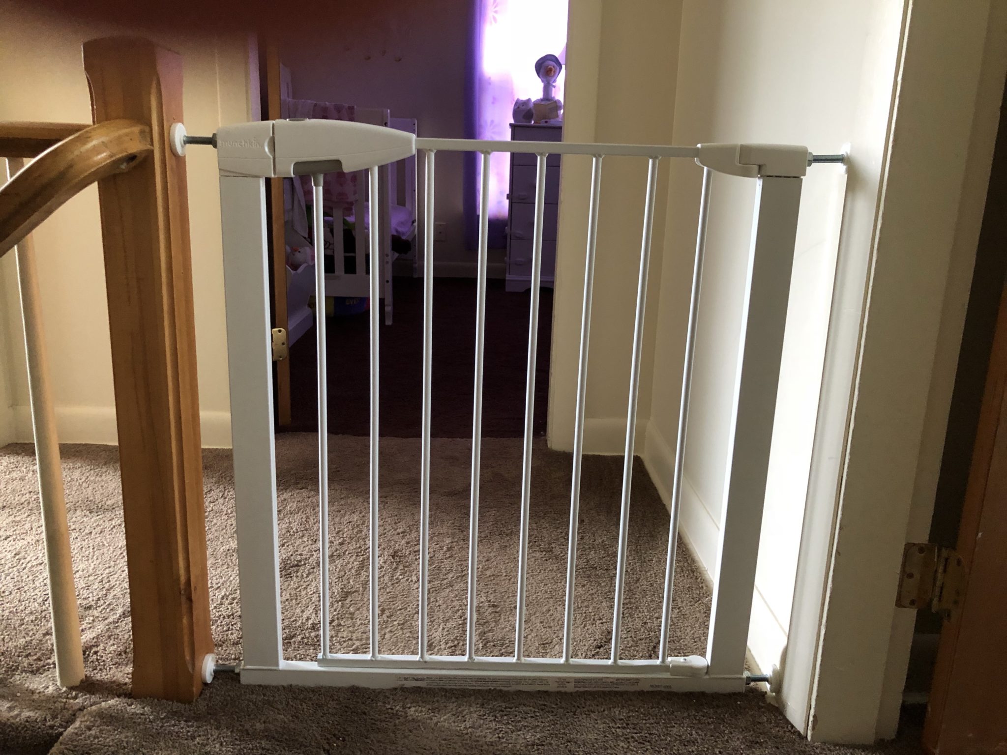 Baby gate separating rooms.