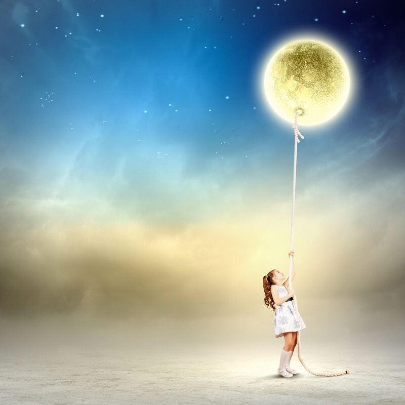 Little girl pulling moon