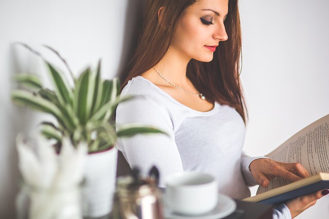 Girl relaxing with a book