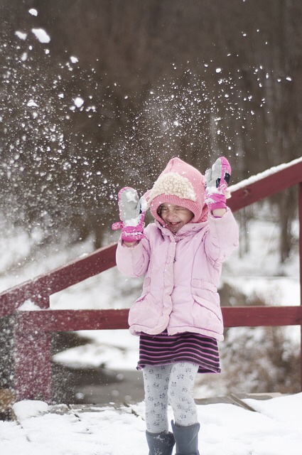 Girl throwing snowball