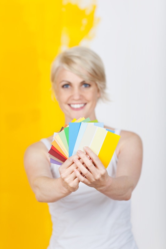 Woman looking at color samples