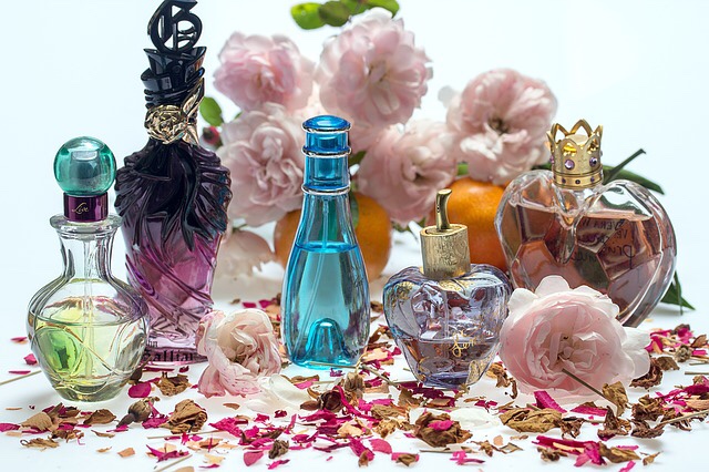 Perfume bottles and roses