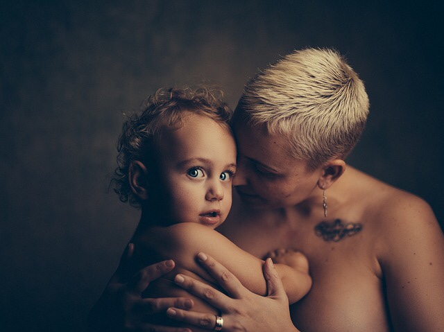 Mother hugging toddler