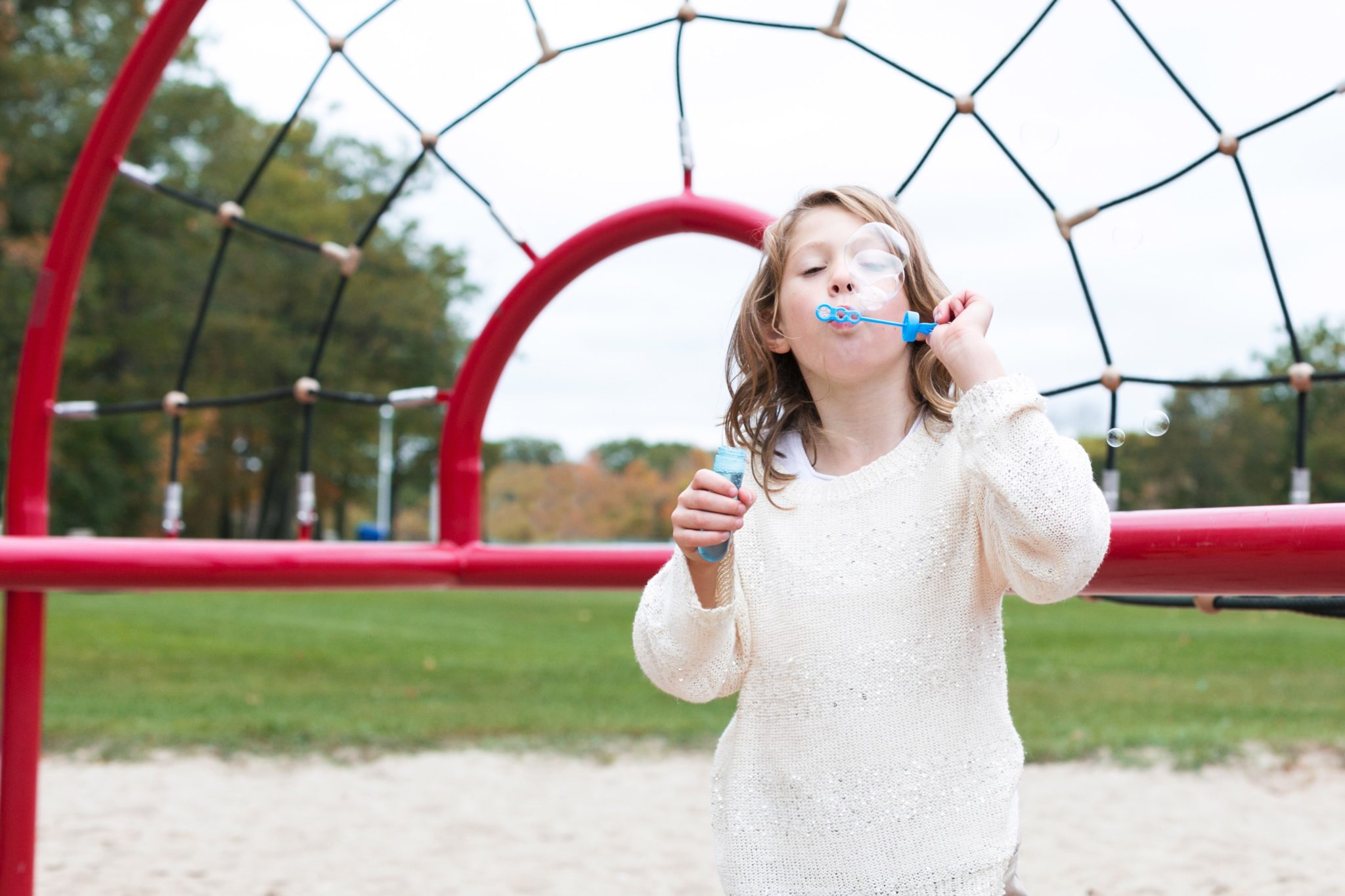 Girl blowing bubbles