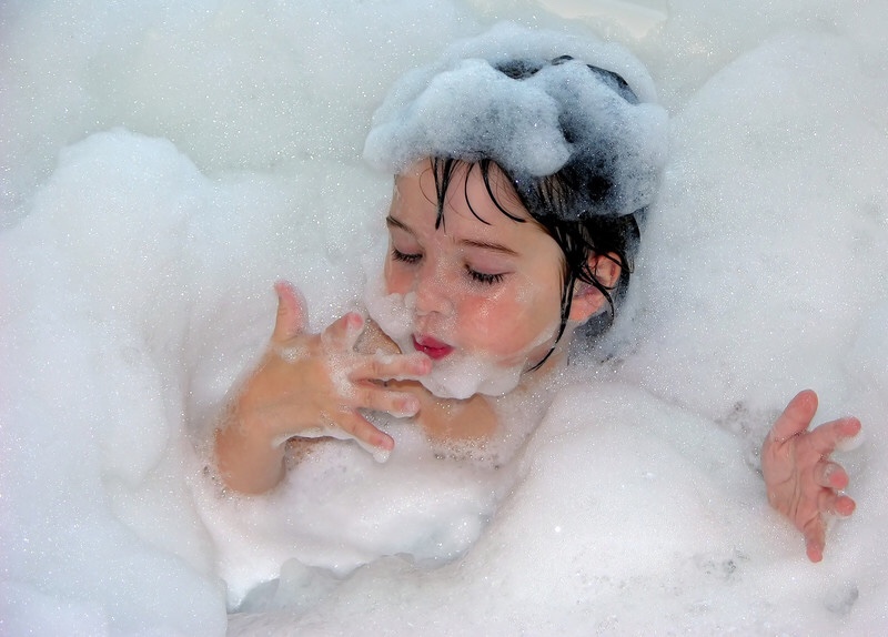 Little girl in bubble bath