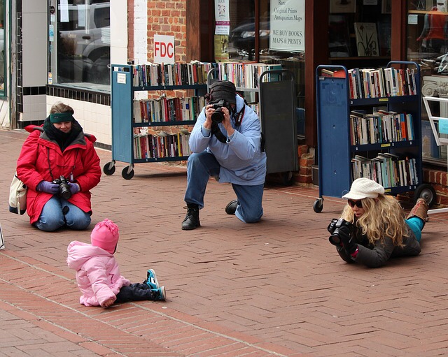 Photographer taking photos of a baby