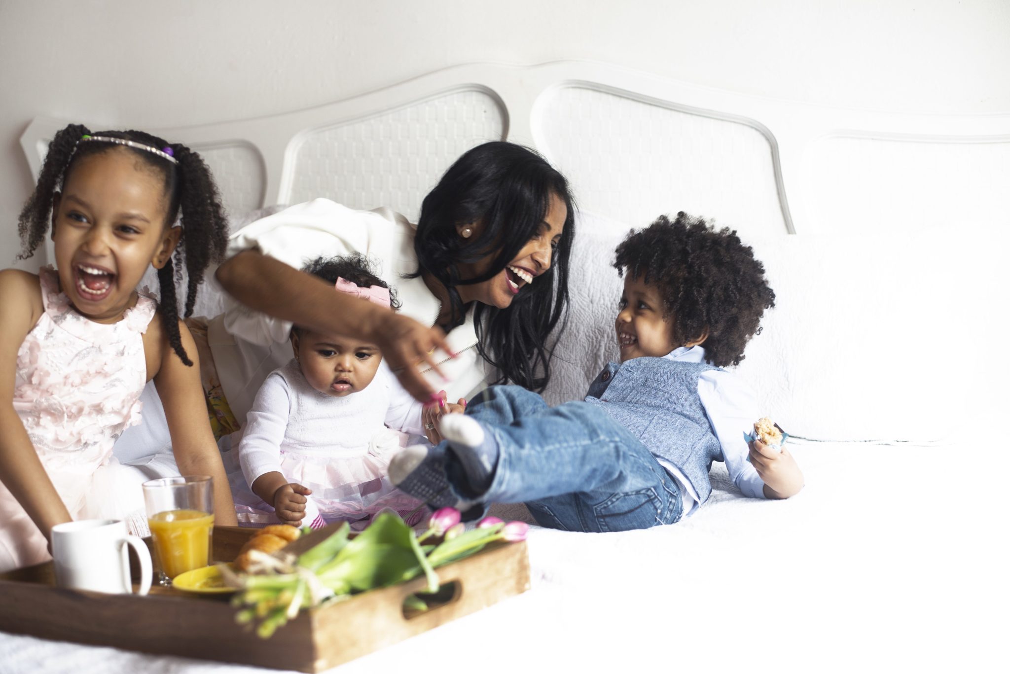 Mother and children laughing