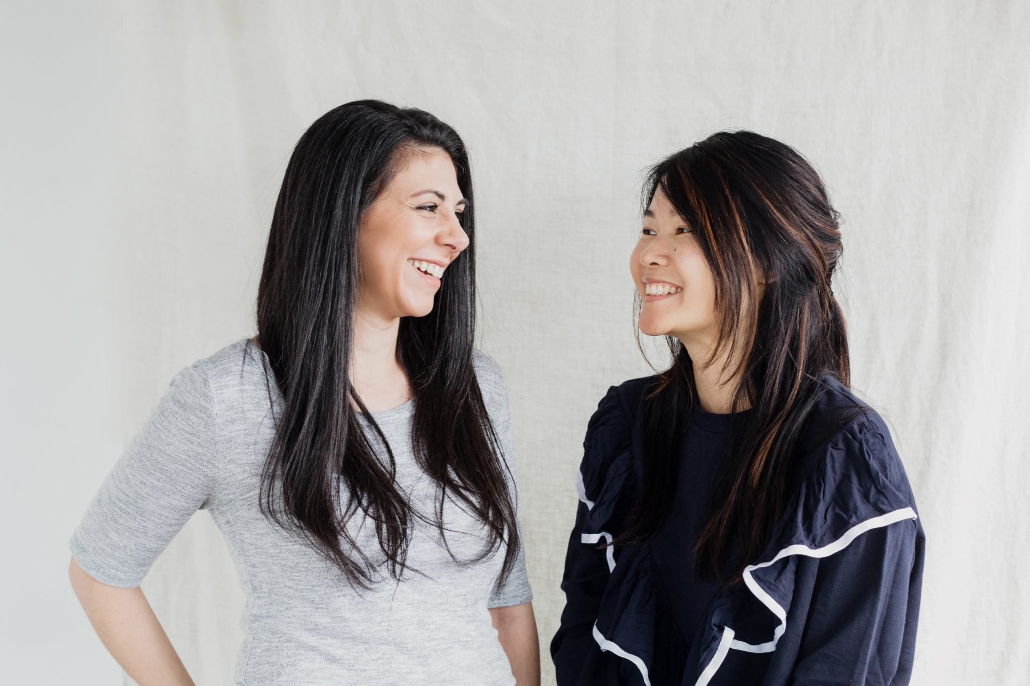 Two women smiling