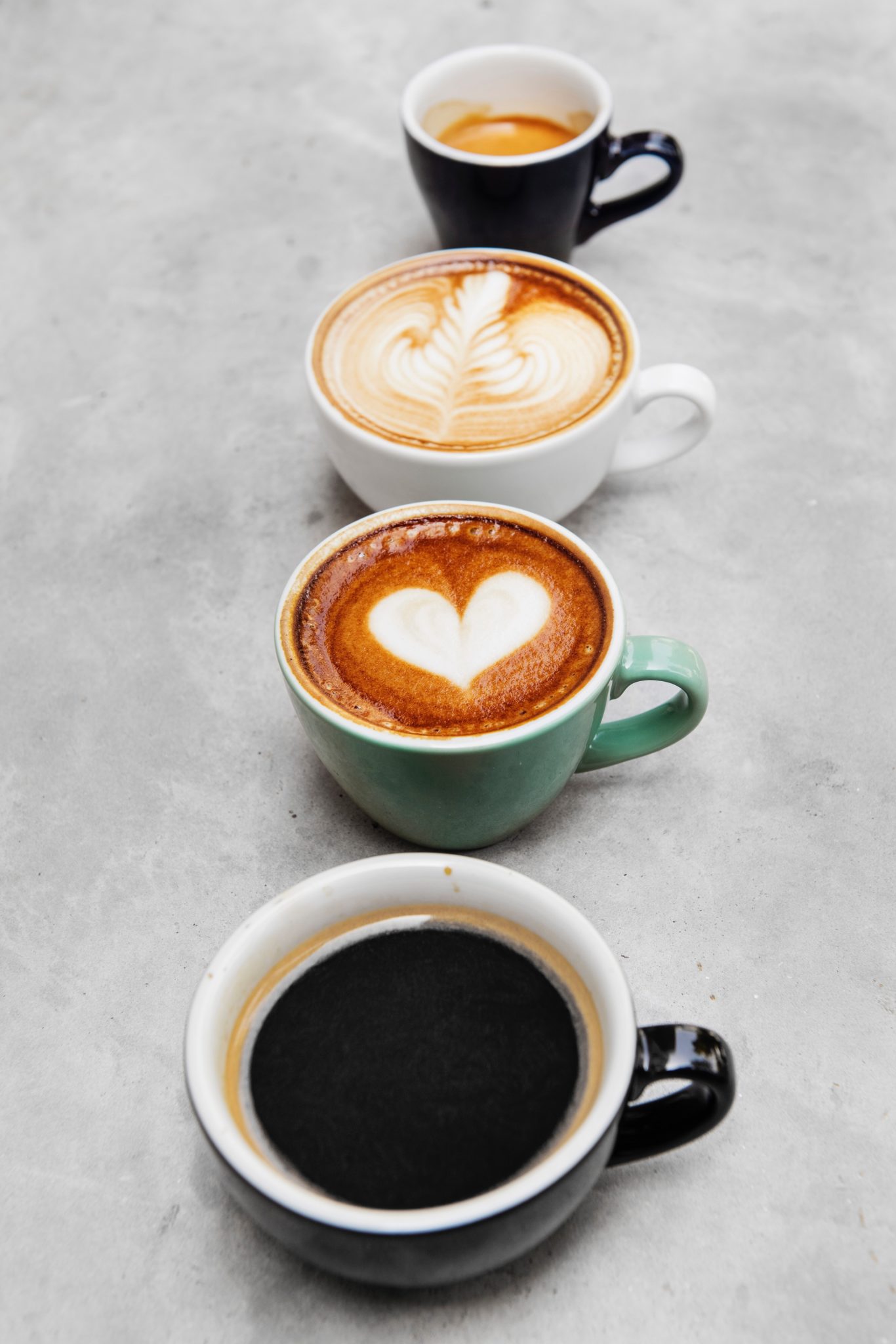 Mugs with different kinds of coffee