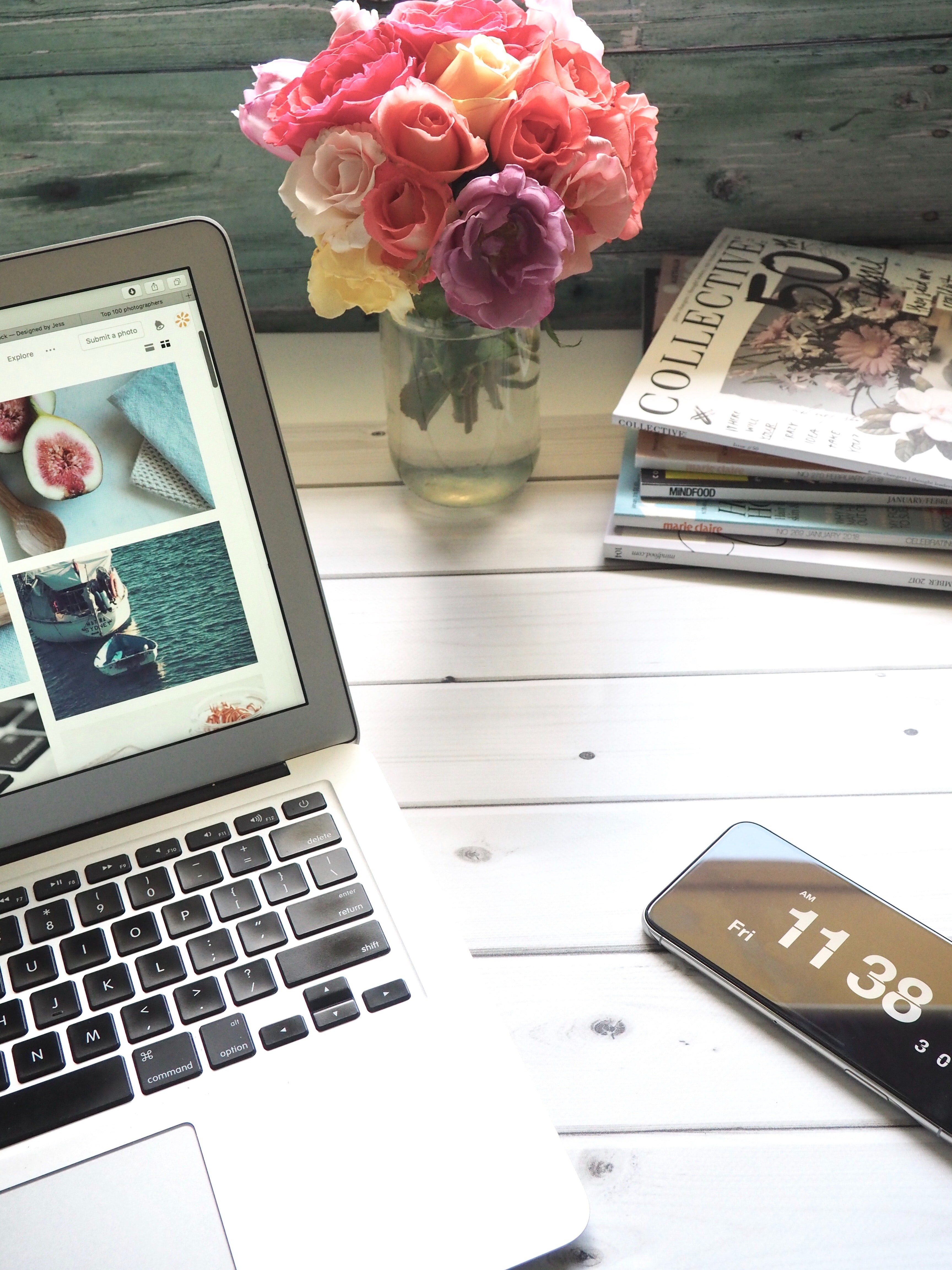 Laptop with coffee and flowers