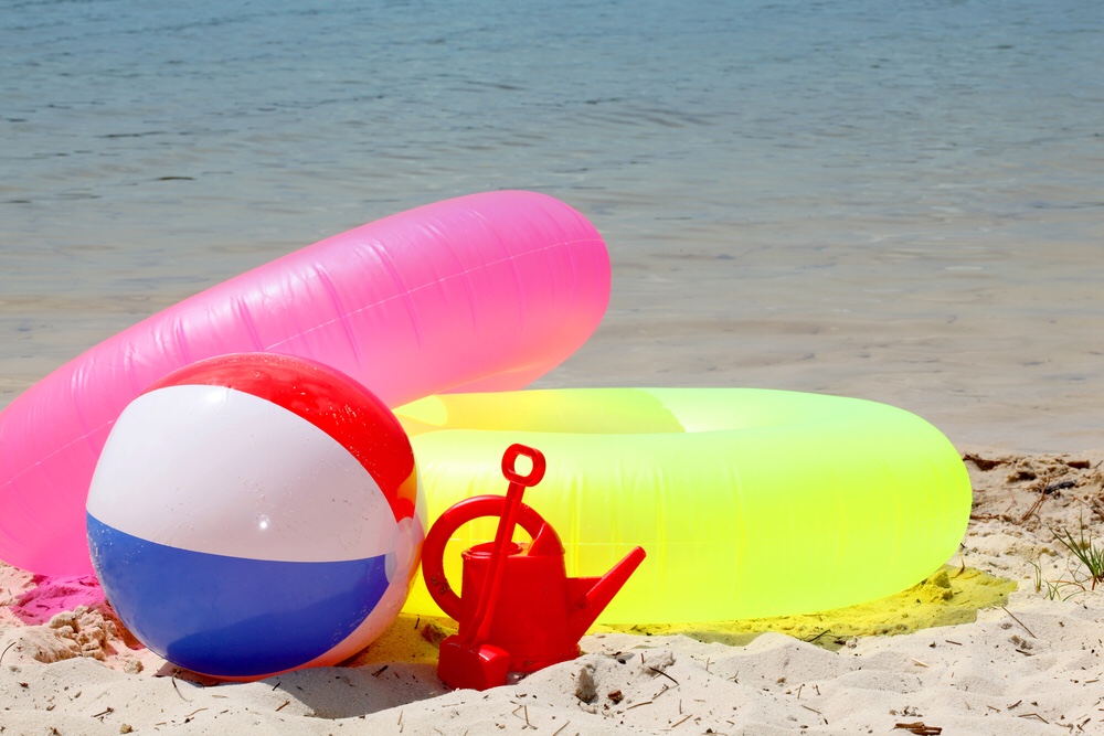 Water toys on a beach