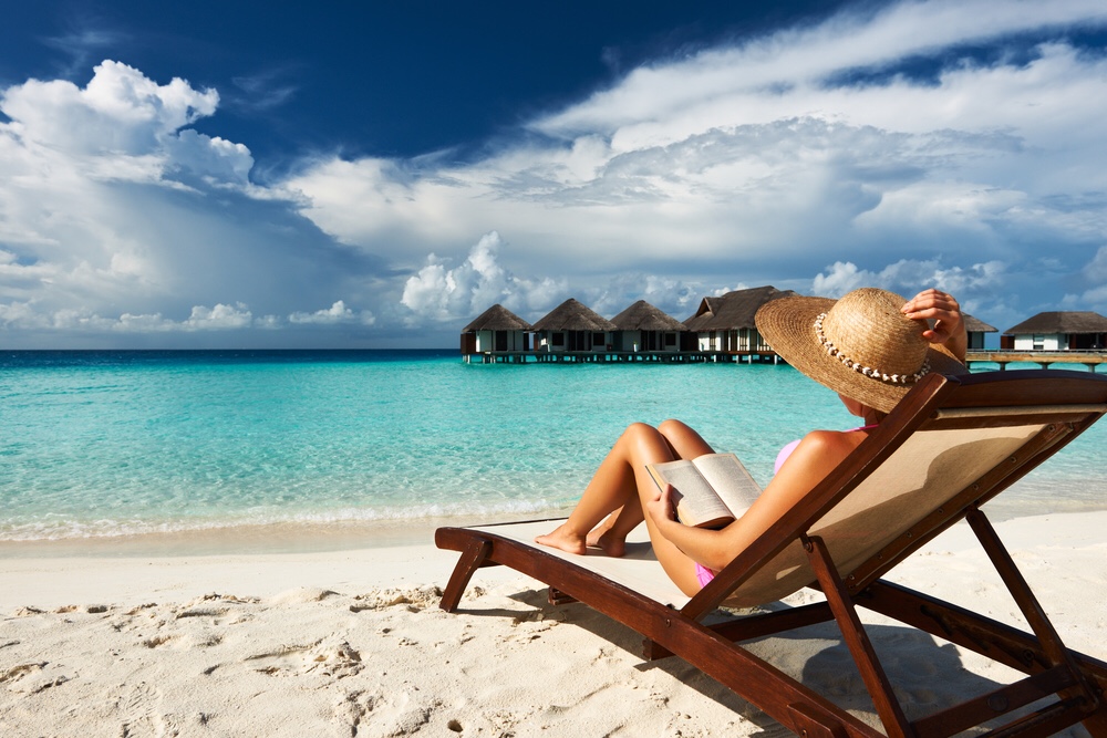 Woman reading on the beach