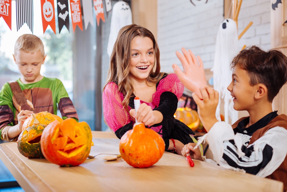 Children dressed up with Halloween toys