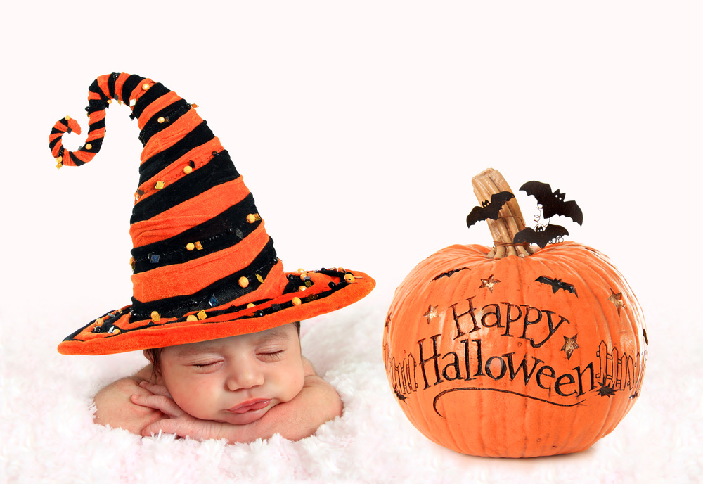 Halloween baby with pumpkin