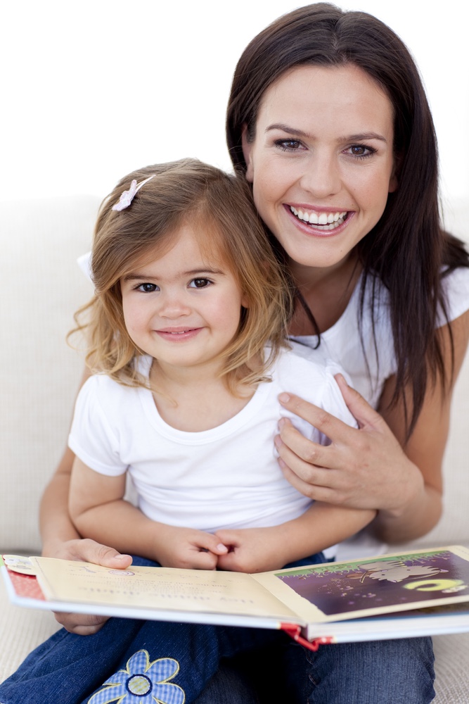 Mother and daughter reading book