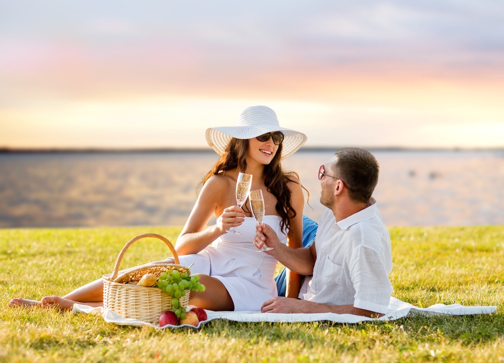 Couple enjoying a Valentines picnic on the beach